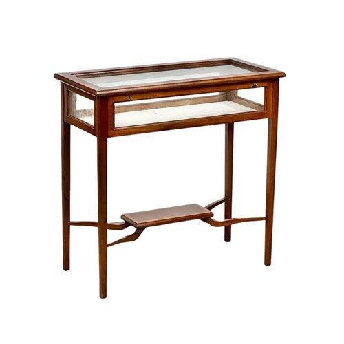 882 - A Sheraton Revival Inlaid mahogany display table with 4 glass panels and bevelled glass top. 85cm x ... 