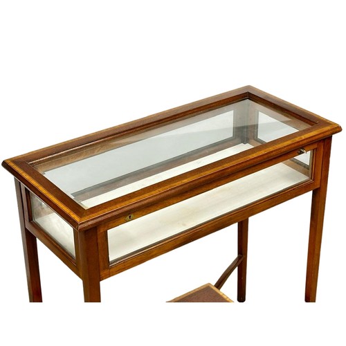 882 - A Sheraton Revival Inlaid mahogany display table with 4 glass panels and bevelled glass top. 85cm x ... 