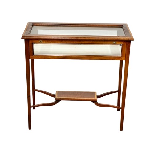 882 - A Sheraton Revival Inlaid mahogany display table with 4 glass panels and bevelled glass top. 85cm x ... 