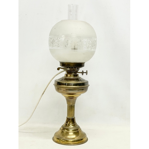 787 - A vintage Victorian style brass table lamp. 57cm