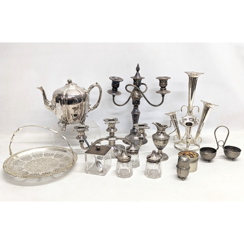 795 - A quantity of silver plate including 2 candleabras, epergne, etc.