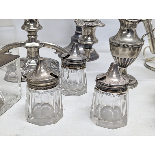 795 - A quantity of silver plate including 2 candleabras, epergne, etc.