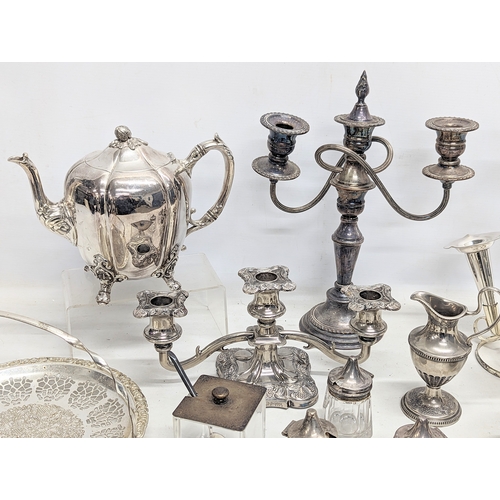 795 - A quantity of silver plate including 2 candleabras, epergne, etc.