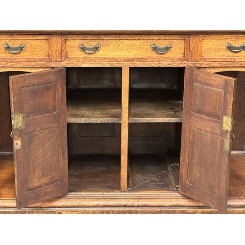 873A - A good quality late 19th century Arts & Crafts oak mirror back sideboard. Circa 1890-1900. 154x62x18... 