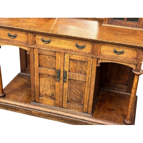 873A - A good quality late 19th century Arts & Crafts oak mirror back sideboard. Circa 1890-1900. 154x62x18... 