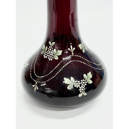 68 - A late 19th century Bohemian hand painted Ruby glass bottle vase. 14x22cm