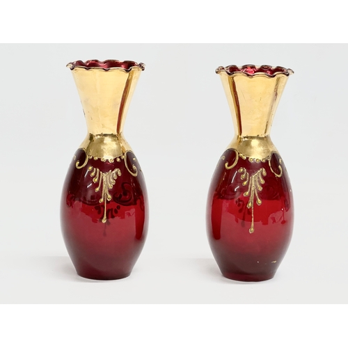 131 - 3 pieces of Venetian Murano ruby glass and gilt vases. 21cm