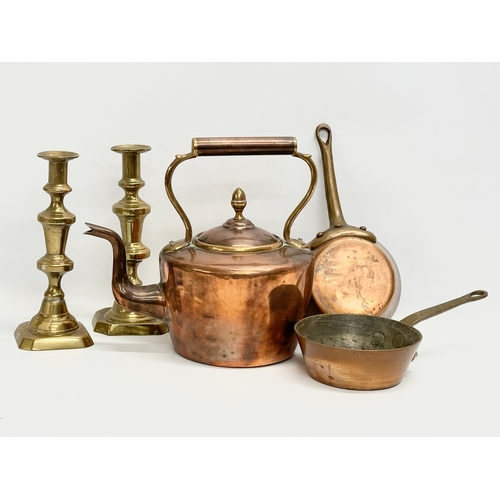 69 - A quantity of Victorian copper and brass. Victorian kettle 30x20x30cm. A pair of Victorian brass can... 