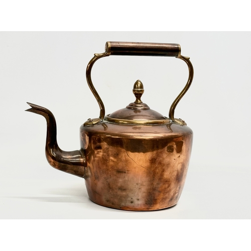 69 - A quantity of Victorian copper and brass. Victorian kettle 30x20x30cm. A pair of Victorian brass can... 