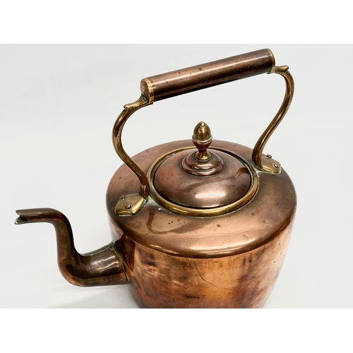 69 - A quantity of Victorian copper and brass. Victorian kettle 30x20x30cm. A pair of Victorian brass can... 