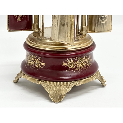 12 - An Italian Rouge brass musical lipstick holder. 28cm