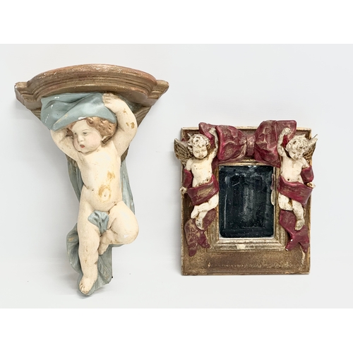 412 - A cherub wall bracket and mirror. 23x31cm. 23x23cm