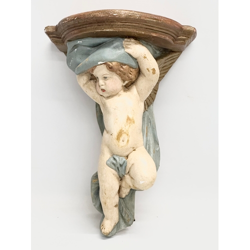 412 - A cherub wall bracket and mirror. 23x31cm. 23x23cm