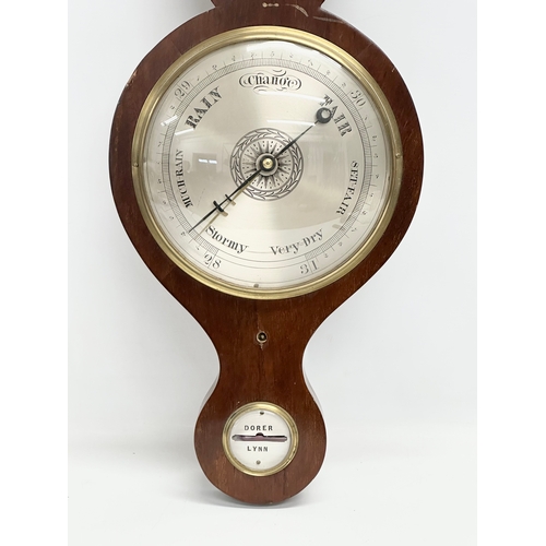 14 - An early 20th century George III style mahogany barometer with later alterations and convex mirror p... 