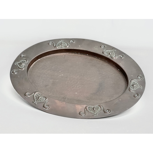 71 - An early 20th century Art Nouveau copper tray. Circa 1900-1910. 31x24cm