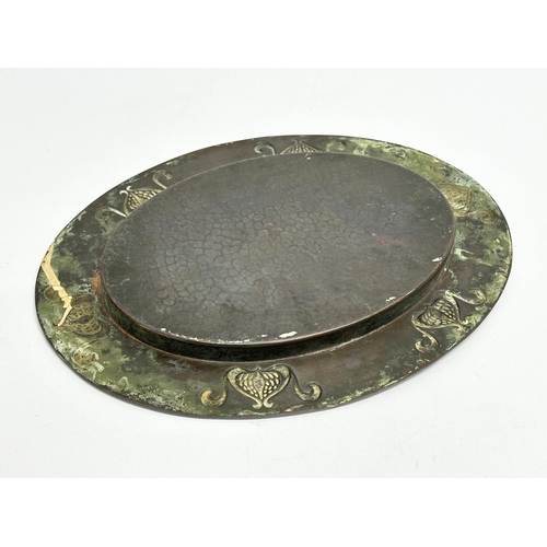 71 - An early 20th century Art Nouveau copper tray. Circa 1900-1910. 31x24cm