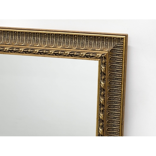 139 - A large gilt framed mirror. 104x74cm