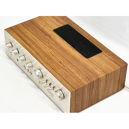 413 - A Rotel RA-312 Integrated Stereo Amplifier. 40x26x11.5cm