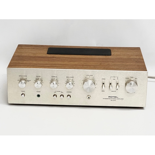 413 - A Rotel RA-312 Integrated Stereo Amplifier. 40x26x11.5cm