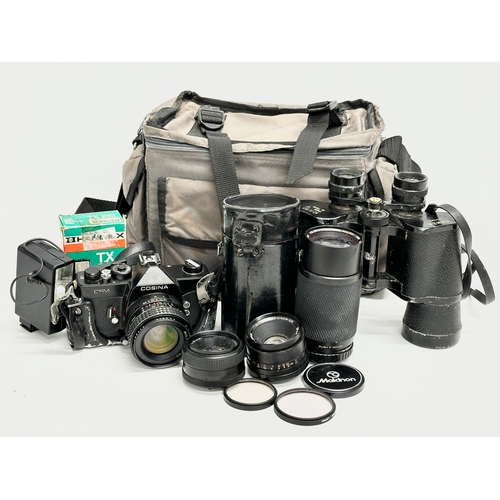 414 - Camera, lenses and binoculars. A Cosina CSM camera with Macro lens, Yashinon-DS lens, Cosinon lens a... 