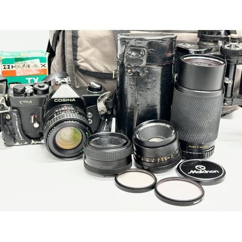 414 - Camera, lenses and binoculars. A Cosina CSM camera with Macro lens, Yashinon-DS lens, Cosinon lens a... 