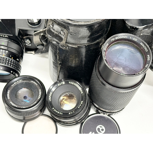 414 - Camera, lenses and binoculars. A Cosina CSM camera with Macro lens, Yashinon-DS lens, Cosinon lens a... 