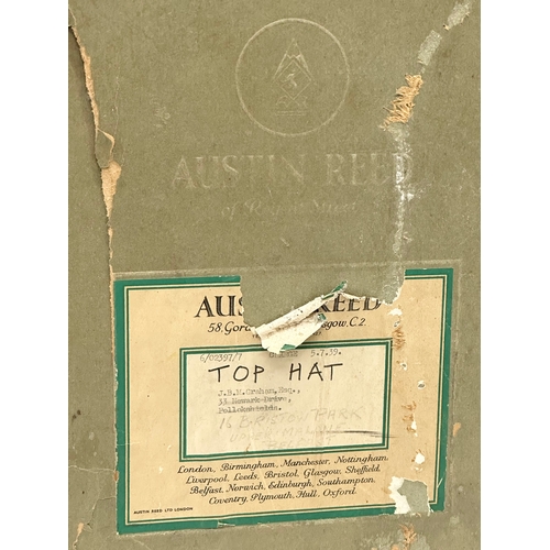 73 - An early 20th century Austin Reid top hat with original box. Circa 1910-1920.  Inside measurements, ... 