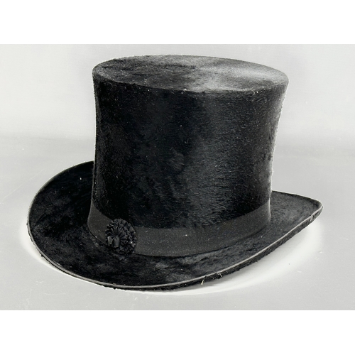 75 - An early 20th century J. Wippell and Co LTD top hat with a Ellwood Hats LTD box. Circa 1910. Inside ... 