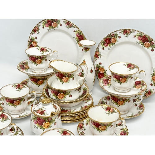 145 - 32 piece of Royal Albert ‘Old Country Roses’ tea service. 2 salad plates, a vase, sugar bowl with li... 