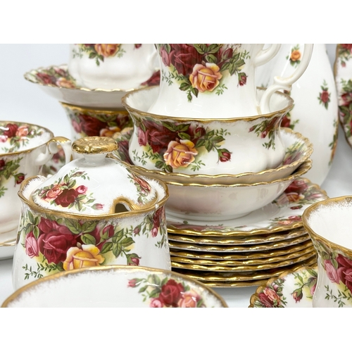 145 - 32 piece of Royal Albert ‘Old Country Roses’ tea service. 2 salad plates, a vase, sugar bowl with li... 