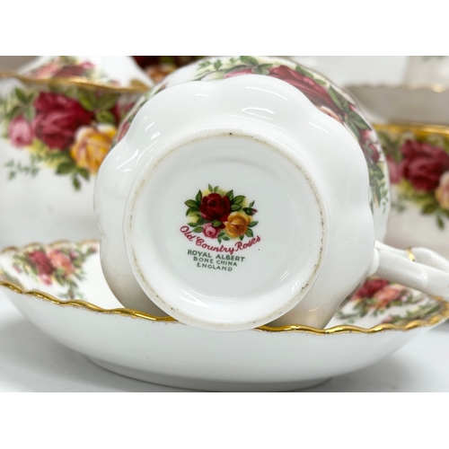 145 - 32 piece of Royal Albert ‘Old Country Roses’ tea service. 2 salad plates, a vase, sugar bowl with li... 