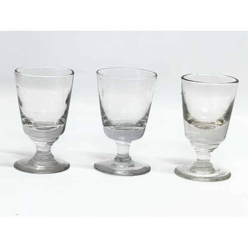 78 - A set of 8 19th Century Victorian glass rummers/dram glasses. Circa 1850-1870. 11cm.