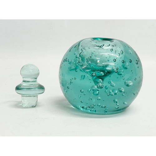 42 - A Victorian glass paperweight inkwell with stopper. 9x11cm