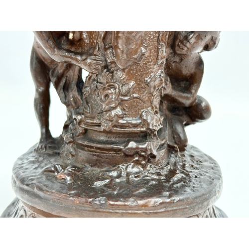 97 - A 19th Century glazed ceramic cherub candleholder. 13x15cm