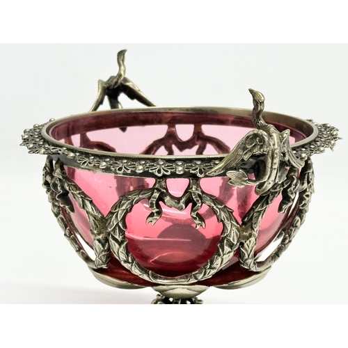 44 - A good quality Victorian silver plated compote with original cranberry glass liner. 18x15x15cm