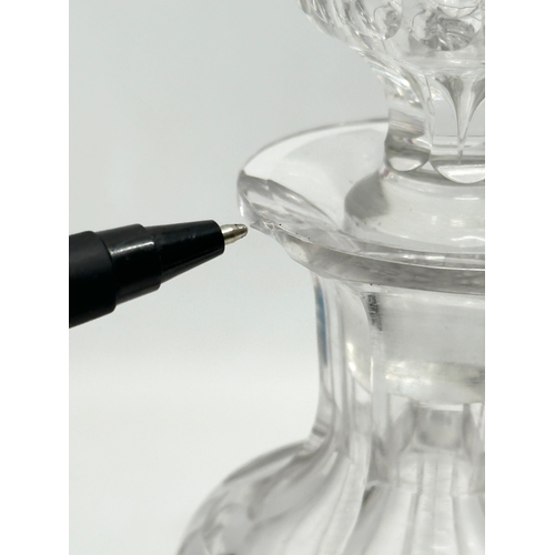 99 - A 19th Century Victorian notch cut decanter and stopper. 29cm