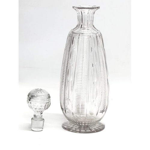 99 - A 19th Century Victorian notch cut decanter and stopper. 29cm