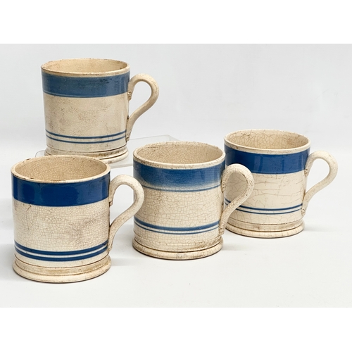 114 - A collection of Mid 19th Century Victorian Mocha Ware mugs. Including a large Edwardian blue and whi... 