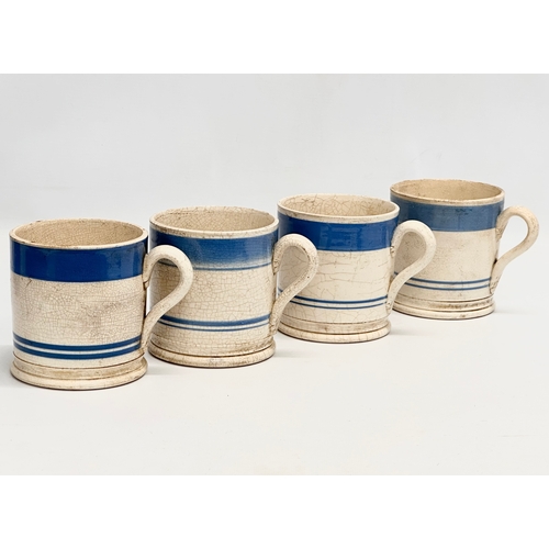 114 - A collection of Mid 19th Century Victorian Mocha Ware mugs. Including a large Edwardian blue and whi... 