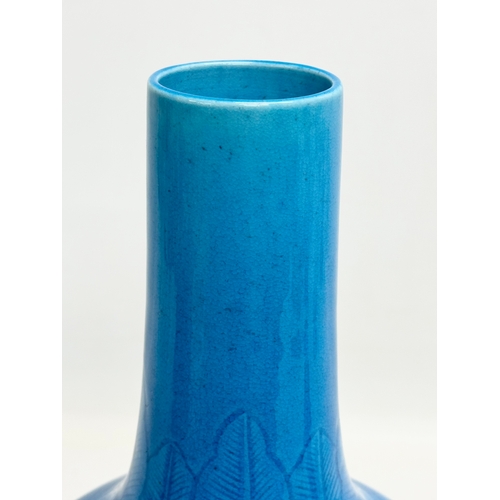 45 - A Chinese Turquoise glazed bottle vase. Early 20th Century. Circa 1900. 16x29cm