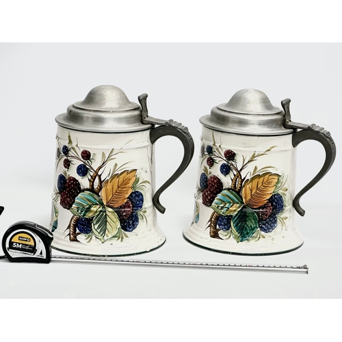 165 - A pair of very large Early/Mid 20th Century Italian enamelled tankards with pewter lids. Mancioli Po... 