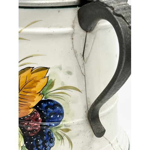 165 - A pair of very large Early/Mid 20th Century Italian enamelled tankards with pewter lids. Mancioli Po... 