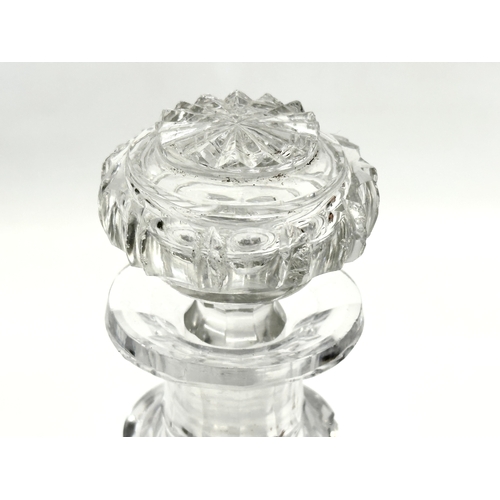 117 - An Early 20th Century Baccarat style decanter with stopper. 19cm