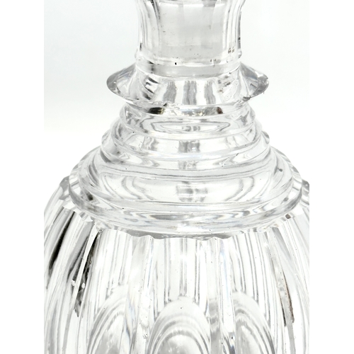 117 - An Early 20th Century Baccarat style decanter with stopper. 19cm