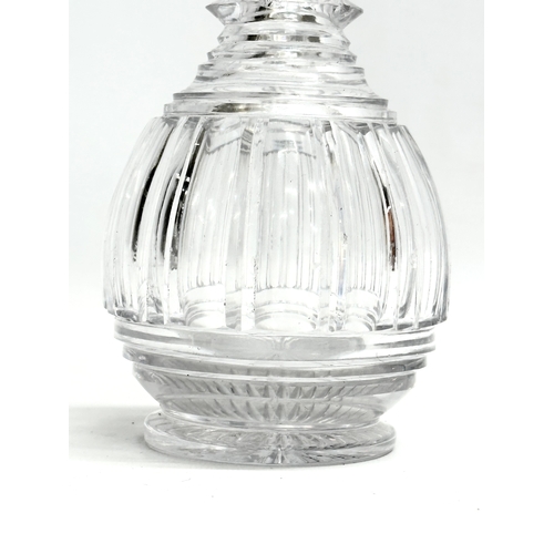 117 - An Early 20th Century Baccarat style decanter with stopper. 19cm