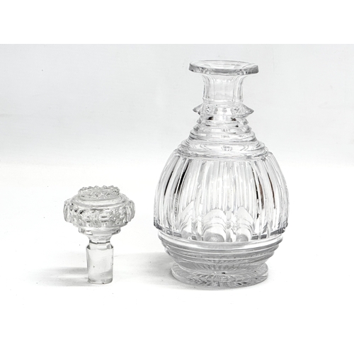 117 - An Early 20th Century Baccarat style decanter with stopper. 19cm