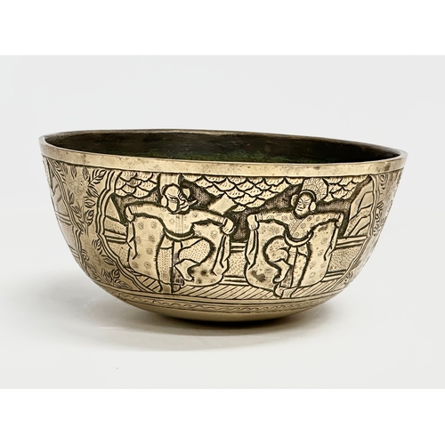 118 - A large Chinese heavy brass bowl. Late 19th/Early 20th Century. 25.5x12cm