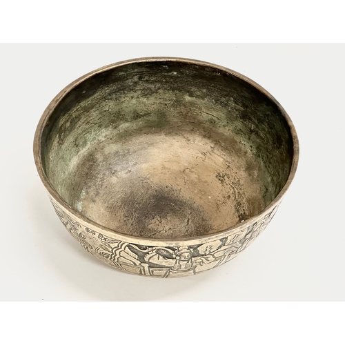 118 - A large Chinese heavy brass bowl. Late 19th/Early 20th Century. 25.5x12cm