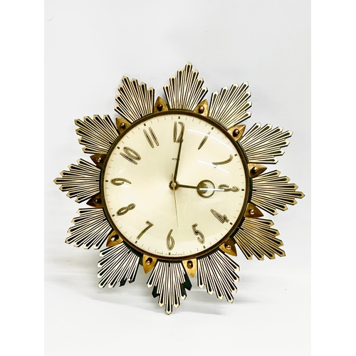 5 - A 1960’s Mid Century Sunburst clock by Metamec. 32x32cm