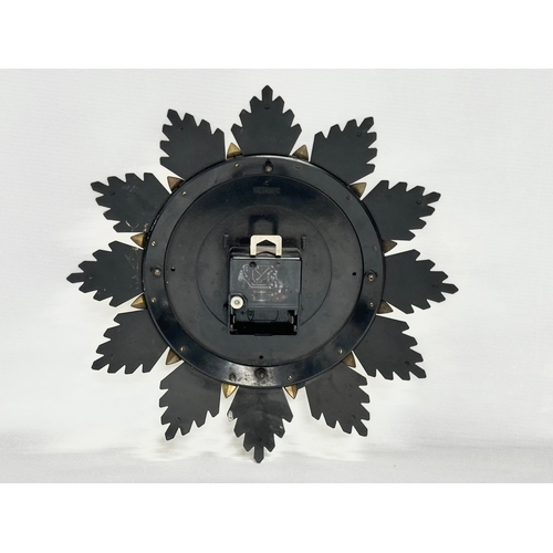 5 - A 1960’s Mid Century Sunburst clock by Metamec. 32x32cm